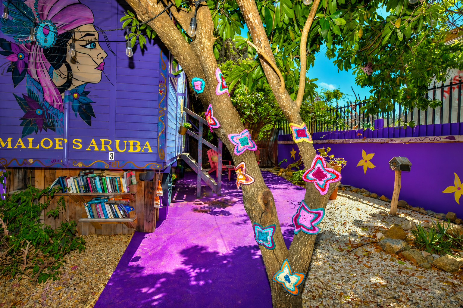 Handmade bohemian art and colorful wagons at Mammaloe’s Aruba