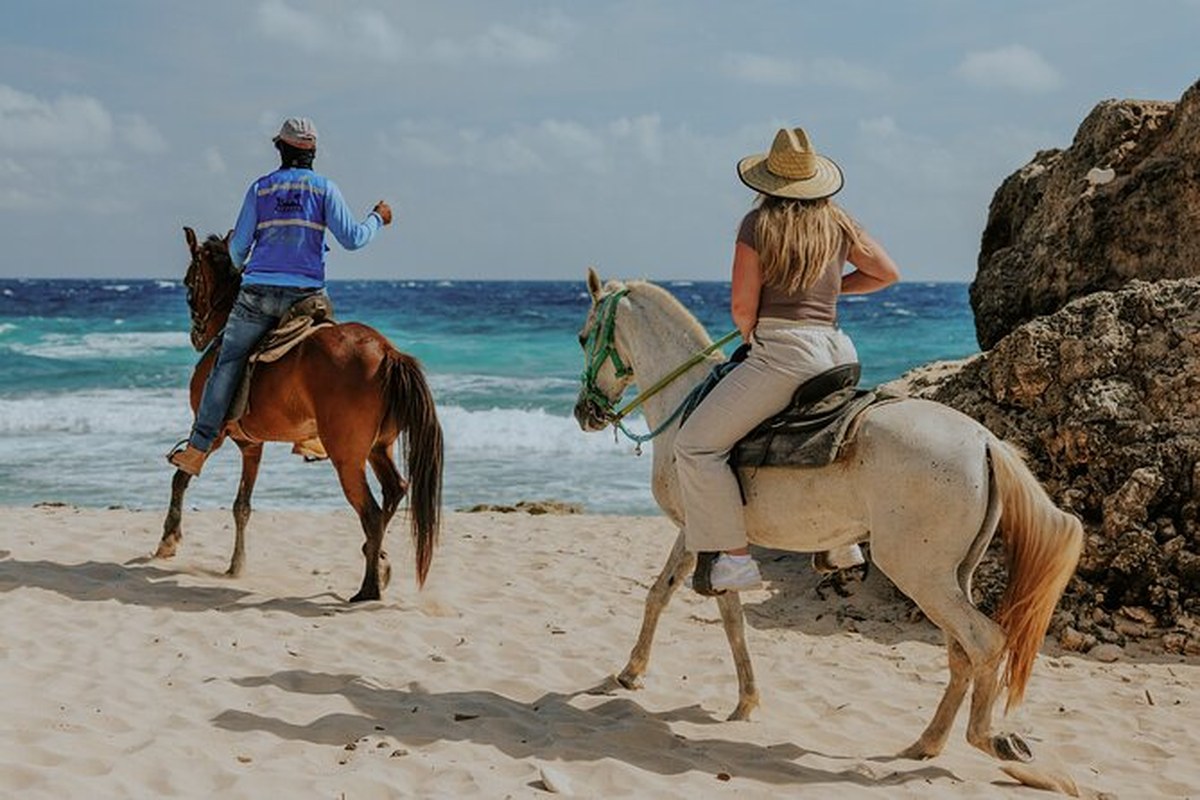 Horseback riding along the beach and scenic coastline in Aruba